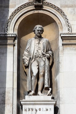 Photo for London, UK - February 26th 2024: A statue of famous artist Joshua Reynolds, on the exterior of Burlington House which is home to the Royal Academy of Art in London, UK. - Royalty Free Image