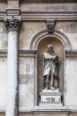 Photo for London, UK - February 26th 2024: Statue of famous architect Sir Christopher Wren, on the exterior of Burlington House which is home to the Royal Academy of Art in London, UK. - Royalty Free Image