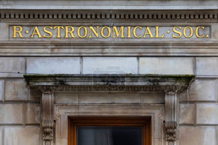 Photo for London, UK - February 26th 2024: The sign above the entrance to the Royal Astronomical Society, located at Burlington House on Piccadilly in London, UK. - Royalty Free Image