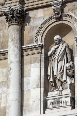 Photo for London, UK - February 26th 2024: A statue of famous sculptor John Flaxman, on the exterior of Burlington House which is home to the Royal Academy of Art in London, UK. - Royalty Free Image