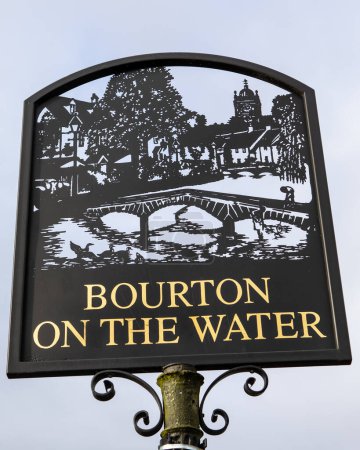 A sign in the picturesque village of Bourton-on-the-Water in the Cotswolds, UK