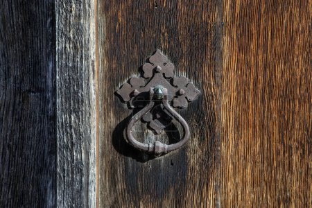 Close-up of the old door knocker on the exterior of the birthplace of famous playwright William Shakespeare in Stratford-Upon-Avon, UK.
