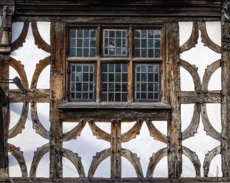 Close-up of an ornate timber-framed building in the historic town of Stratford-Upon-Avon, UK.
