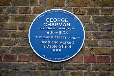 Photo for London, UK - April 3rd 2024: A blue plaque on Cable Street in London, UK, marking the street where Jack the Ripper suspect George Chapman lived and worked in 1888. - Royalty Free Image