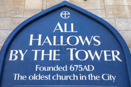 Photo for London, UK - April 17th 2023: A sign at the entrance to the historic All Hallows by the Tower church in London, UK. It is the oldest church in the area of the City of London. - Royalty Free Image