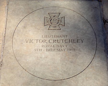 A stone plaque in Sloane Square, London, UK, dedicated to Lieutenant Victor Crutchley who won the Victoria Cross in May 1918 for his heroic actions during the Second Ostend Raid.