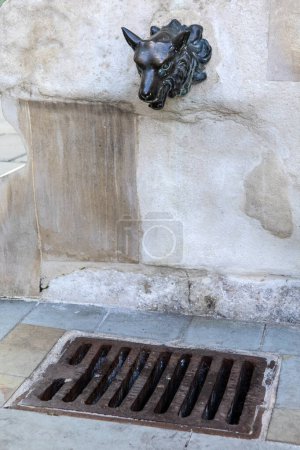 Detail of the historic Aldgate Pump, located in the Aldgate area of the City of London, UK.
