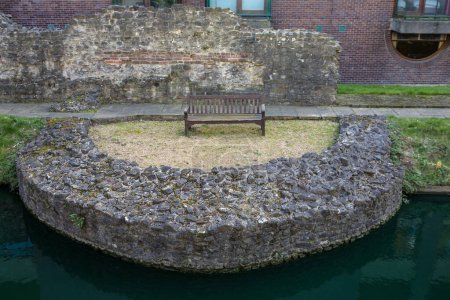 Remains of the historic London Wall, located in the grounds of The Barbican Estate in London, UK.