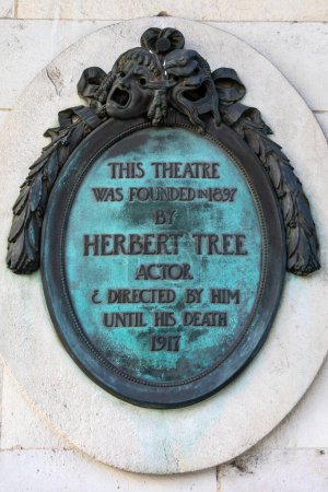 A plaque on the exterior of Her Majestys Theatre on Haymarket in London, UK, commemorating Herbert Tree - the actor and founder of the theatre in 1897.