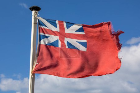Close-up of the Red Ensign which is flown by British merchant and passenger ships since 1707.