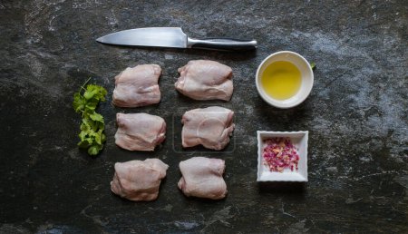 Photo for Lay flat photo of selective chicken meat cuts displayed to make it look appetizing and ready to cook. - Royalty Free Image