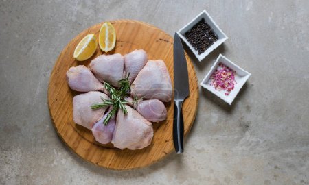 Photo for Lay flat photo of selective chicken meat cuts displayed to make it look appetizing and ready to cook. - Royalty Free Image