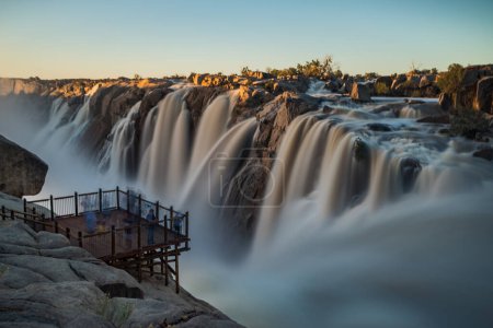Photo for Wide angle view of the Augrabies falls in full flood on the Orangeriver in the northern cape of south africa - Royalty Free Image