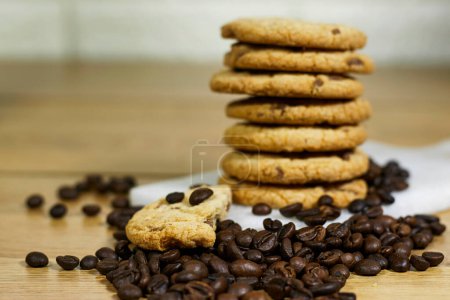 Photo for Coffee bean, homemade tasty cookies on cutting board - Royalty Free Image