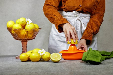 lifestyle photo of woman preparing a lemon citrus juice