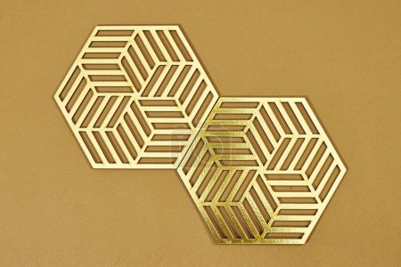 Golden shape hexagon cell tiling on the luxury decoration interior Gold wood honeycomb, hexagon, abstract metal background