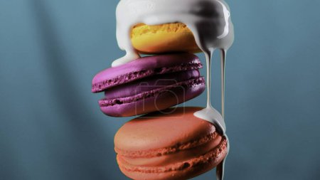 Close up of white glaze draining down the three macarons on a colorful wall background. Stock clip. Sweet food porn concept