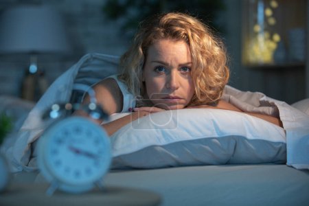 young beautiful woman at home suffering insomnia