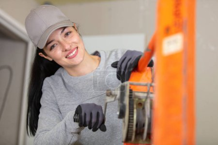 woman worker in metal workshop