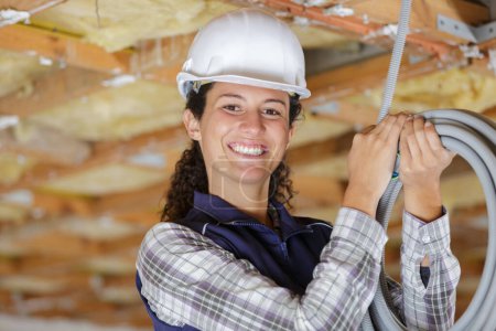 a builder woman with cable