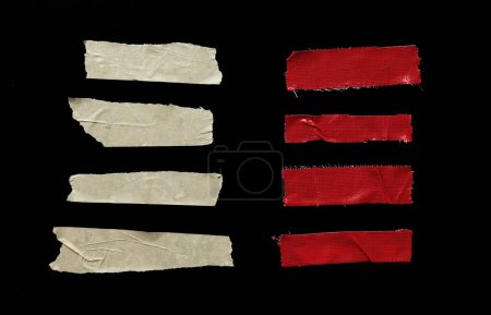 Photo for Set of pieces of general purpose yellow and red tape isolated on black - Royalty Free Image