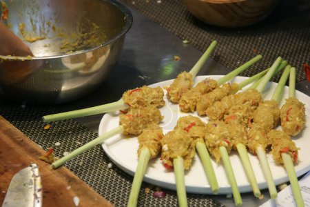 Photo for Indonesian lemongrass satay preparation steps - Royalty Free Image