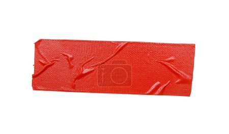 Foto de Un pedazo de vinilo de propósito general cinta roja aislada en blanco. - Imagen libre de derechos