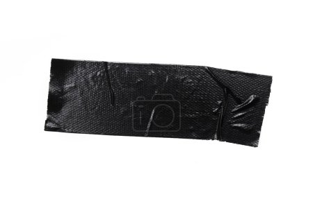Foto de Un pedazo de vinilo de propósito general cinta negra aislada en blanco - Imagen libre de derechos