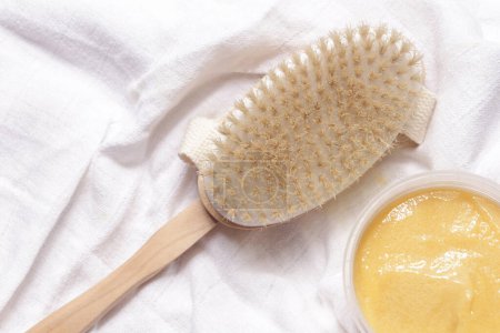 Photo for Dry skin wooden body brush for anti cellulite and lymphatic drainage massage - Royalty Free Image