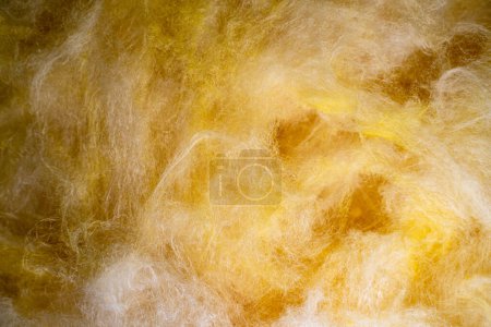 Photo for Glass wool close-up. Texture of fibrous mineral thermal insulation material - Royalty Free Image