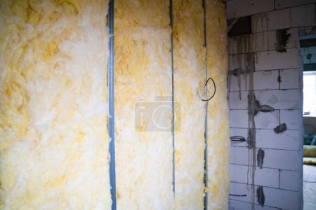 Photo for The frame interior partition is filled with mineral glass wool. Insulation and sound insulation - Royalty Free Image