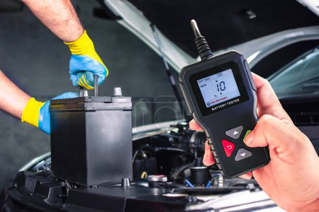 Car battery testing with battery tester , SOH State of health battery condition is bad , Car maintenance concept