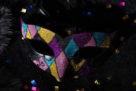 Photo for Carnival mask with glitters on black background. - Royalty Free Image