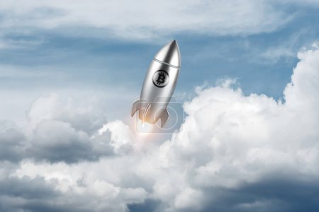 Photo for Silver rocket launch with a bitcoin sign on sky background. Minimal investment concept. - Royalty Free Image