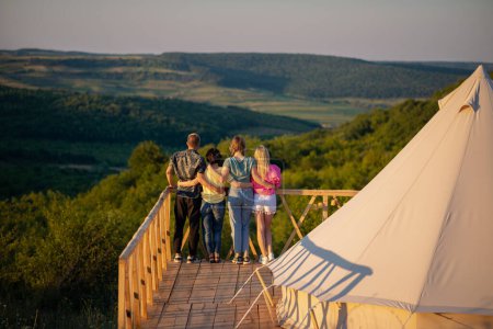 Photo for Birds eye view at the modern campsite place group of students have fun time enjoy the view of nature and chilling. - Royalty Free Image