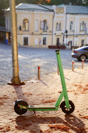 Photo for Electric kick scooter for rent on the city street - Royalty Free Image