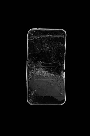 Photo for Mobile smartphone with broken screen on black background - Royalty Free Image