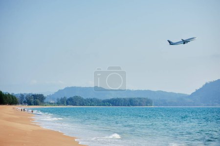 Photo for The airplane flying up on a beach in Phuket, Thailand. - Royalty Free Image
