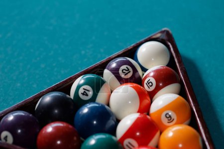 Photo for Billiard balls in the triangle on the snooker table. - Royalty Free Image