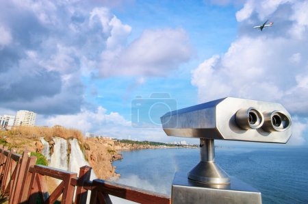 Photo for Coin Operated Binocular viewer next to the waterside promenade in Antalya looking out to the Duden waterfall and city. - Royalty Free Image