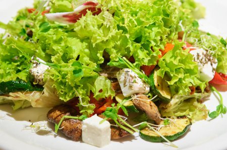 Photo for Close up of salad with grilled meat and vegetables and fetta che - Royalty Free Image