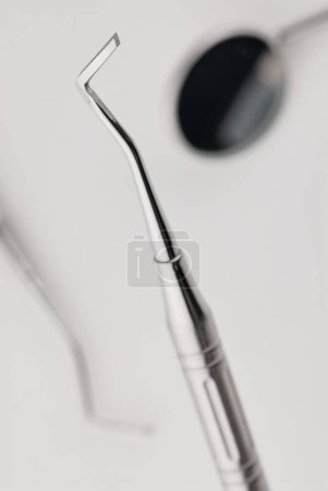 Photo for Basic dentist tools on white background. - Royalty Free Image