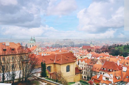 Photo for Travel and architecture. Cityscape with red tiled roofs view. Prague, Czech Republic. - Royalty Free Image