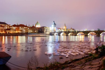 Photo for Prague ,view of the Lesser Bridge Tower of Charles Bridge (Karluv Most) at dusk, Czech Republic. - Royalty Free Image