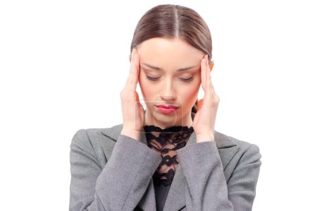Photo for Feeling exhausted. Depressed young caucasian businesswoman touching her head and keeping eyes closed while standing against white background - Royalty Free Image