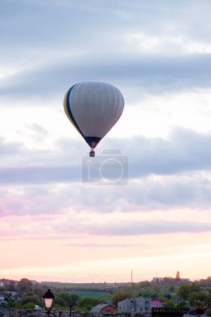 Aerostatics and aeronautics. Airballoon against sky.