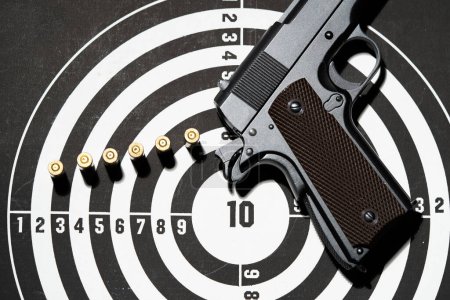 Photo for Gun and many bullets shooting targets. Training for aiming and shooting accuracy - Royalty Free Image
