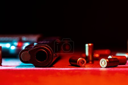 Photo for Crime scene of a hanggun with empty shell casings. - Royalty Free Image