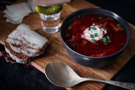 Photo for Traditional ukrainian cuisine. Bowl with tasty red borscht soup. - Royalty Free Image