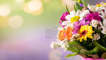 Colorful vibrant bouquet of various flowers with blurred background and copy space, bright lighting, mother's day